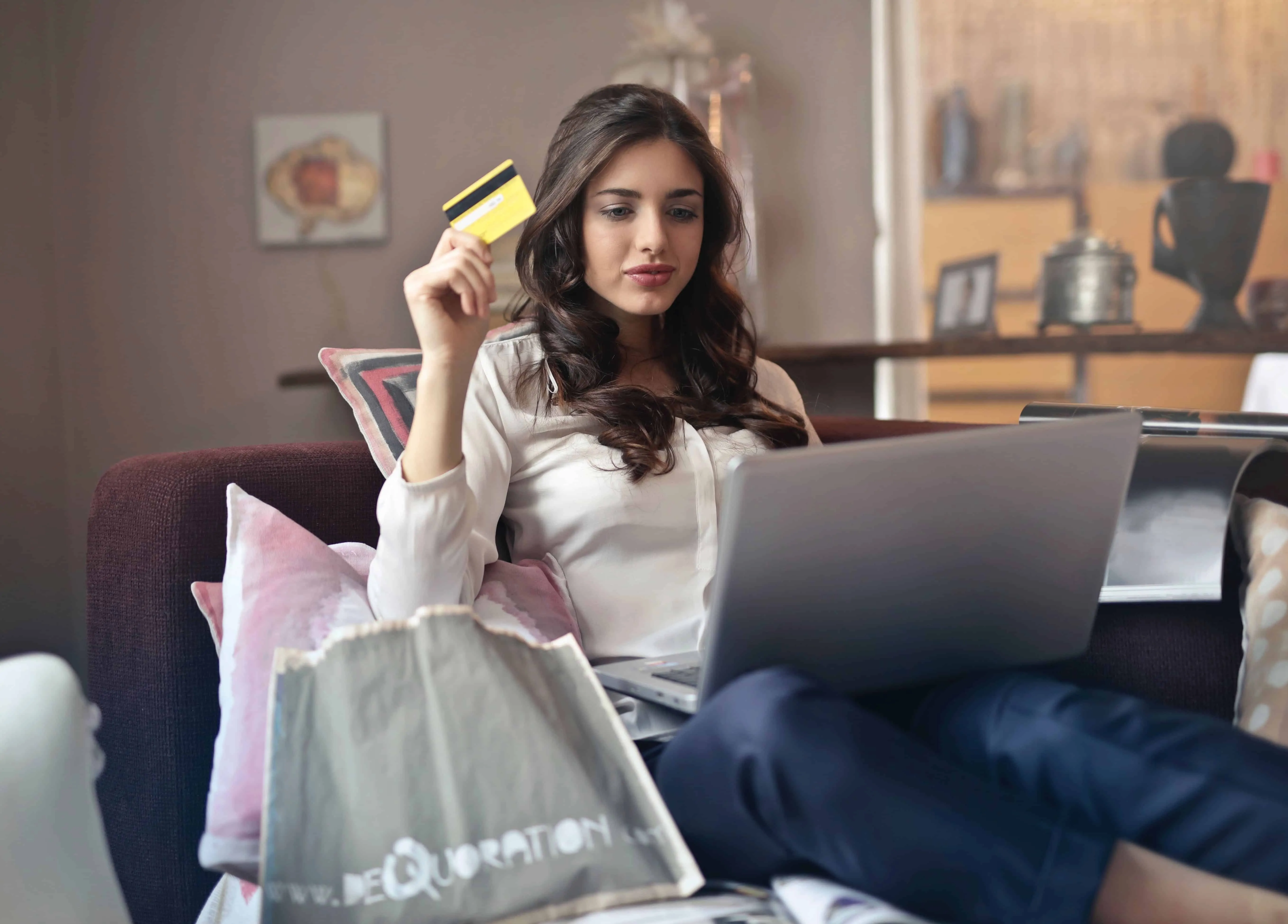 woman-online-shopping-holding-credit-card